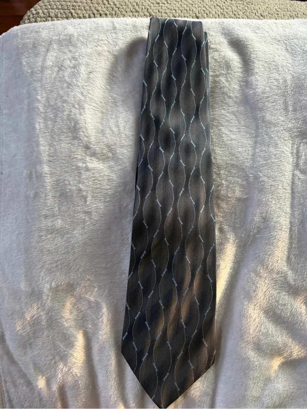 Classic Black Men's Tie with Subtle Blue Wave Pattern - Joseph & Feiss - NWT
